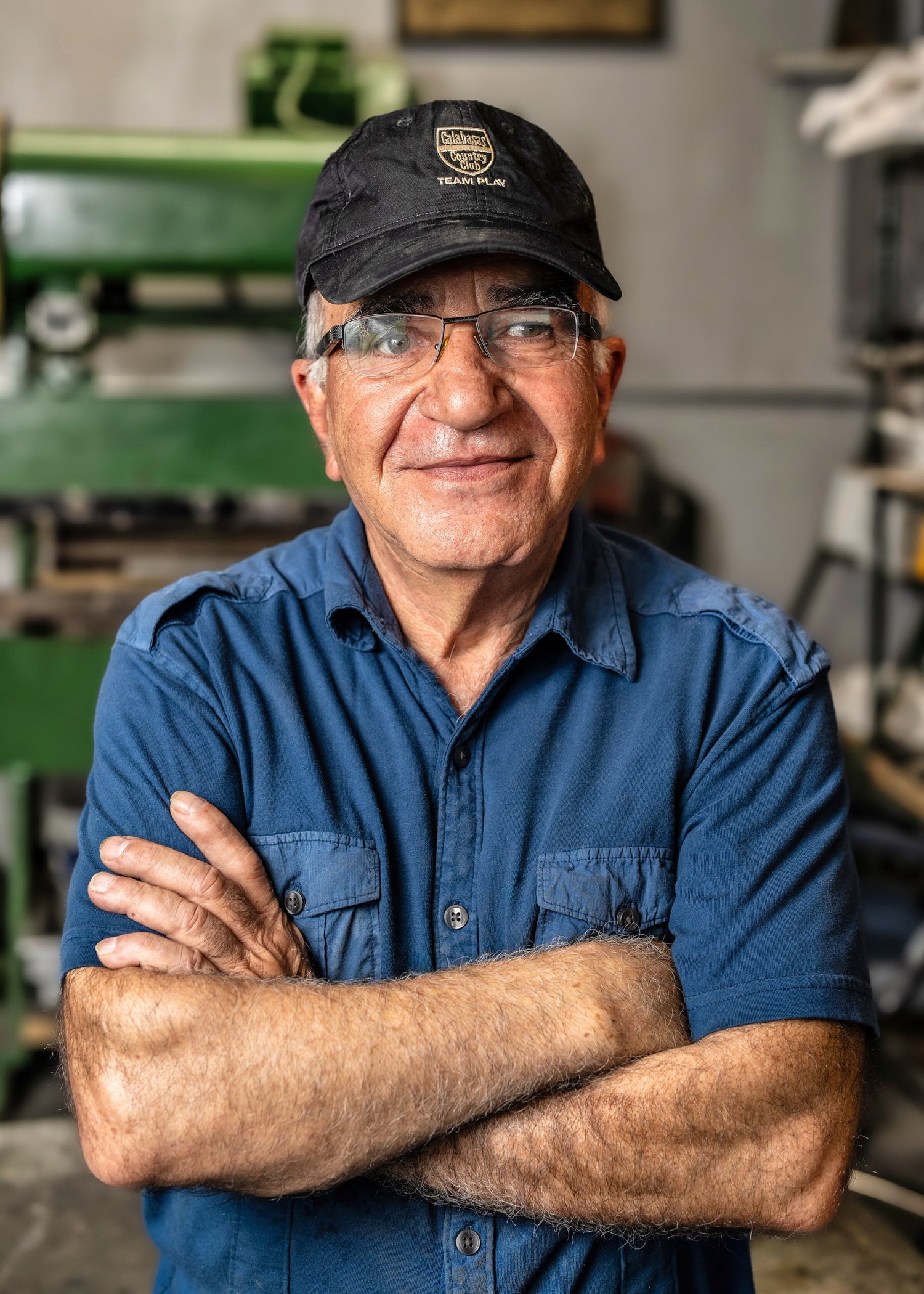 Headshot of Ray Rowghani, founder of Luxe Planter, in his workshop